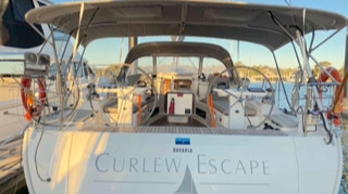 Yacht stern closeup of Sailing Yacht Curlew Escape, available for private yacht charters on Moreton Bay, Brisbane.