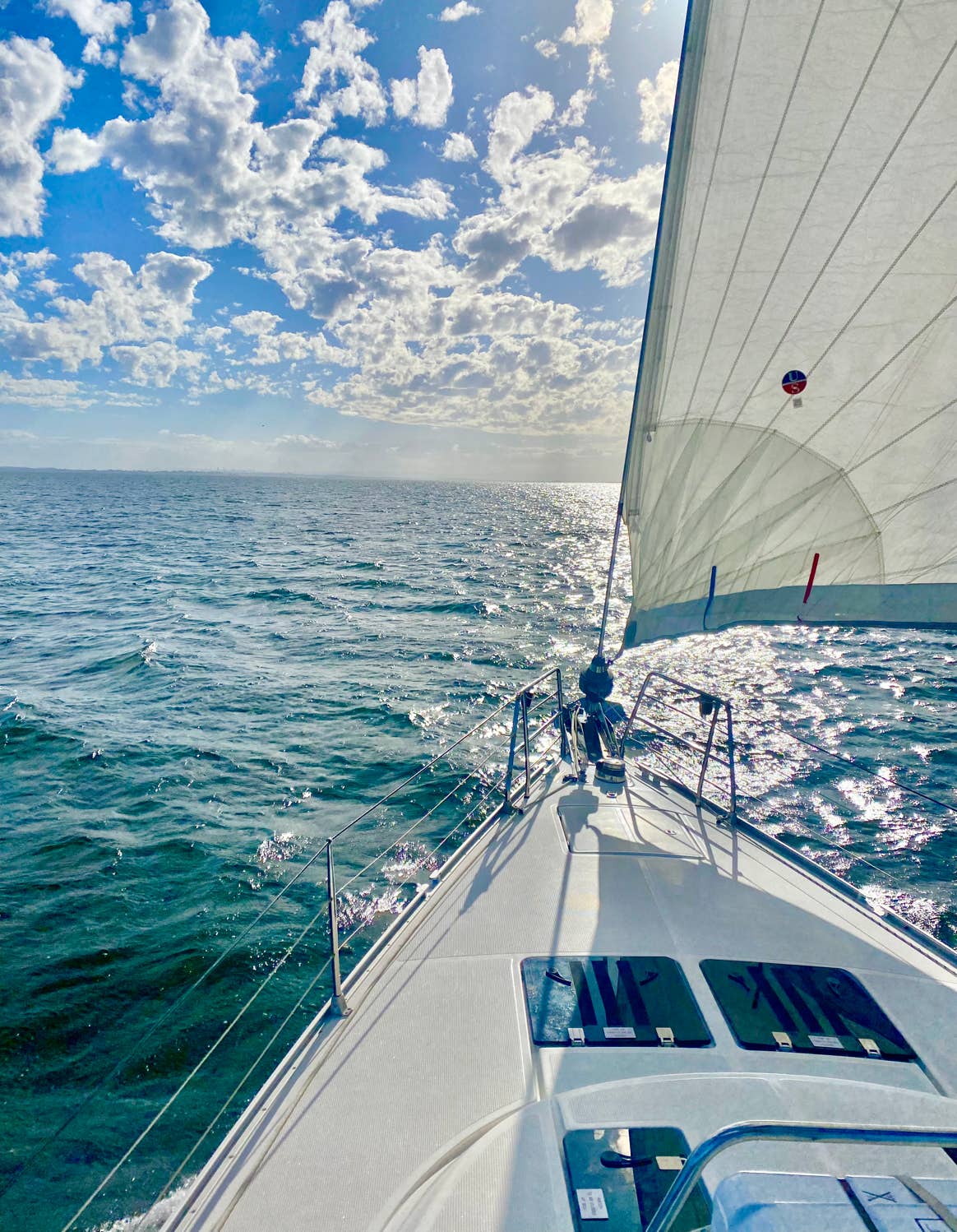 Private spreading of the ashes ceremony on a private yacht charter, Moreton Bay, Brisbane.