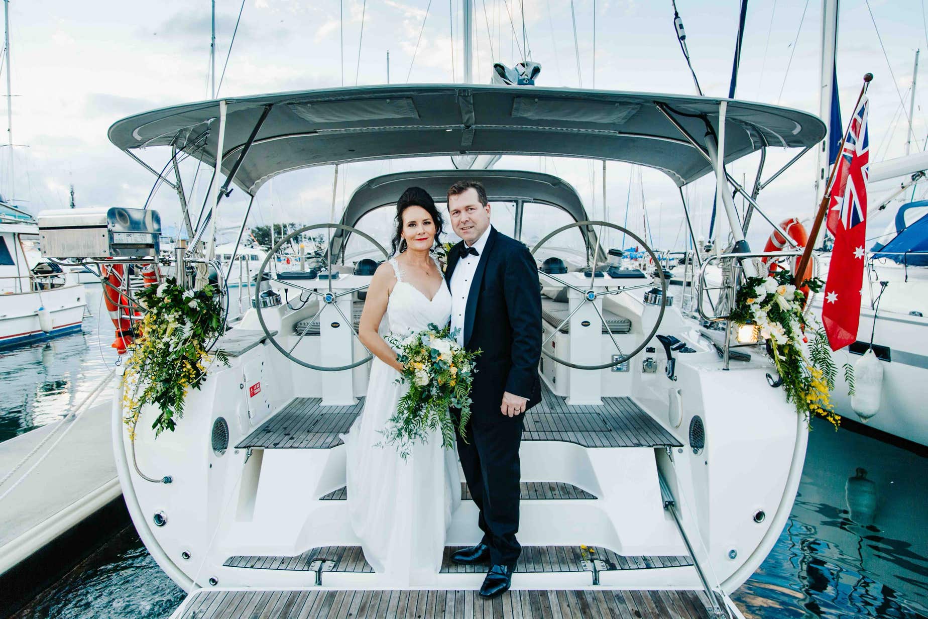 Wedding reception arrival on a private yacht charter on Curlew Escape, Moreton Bay, Brisbane.