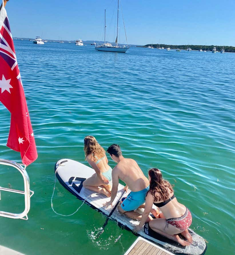 SUP at Horseshoe Bay, Peel Island, Moreton Bay, Brisbane while on a private yacht charter aboard Curew Escape