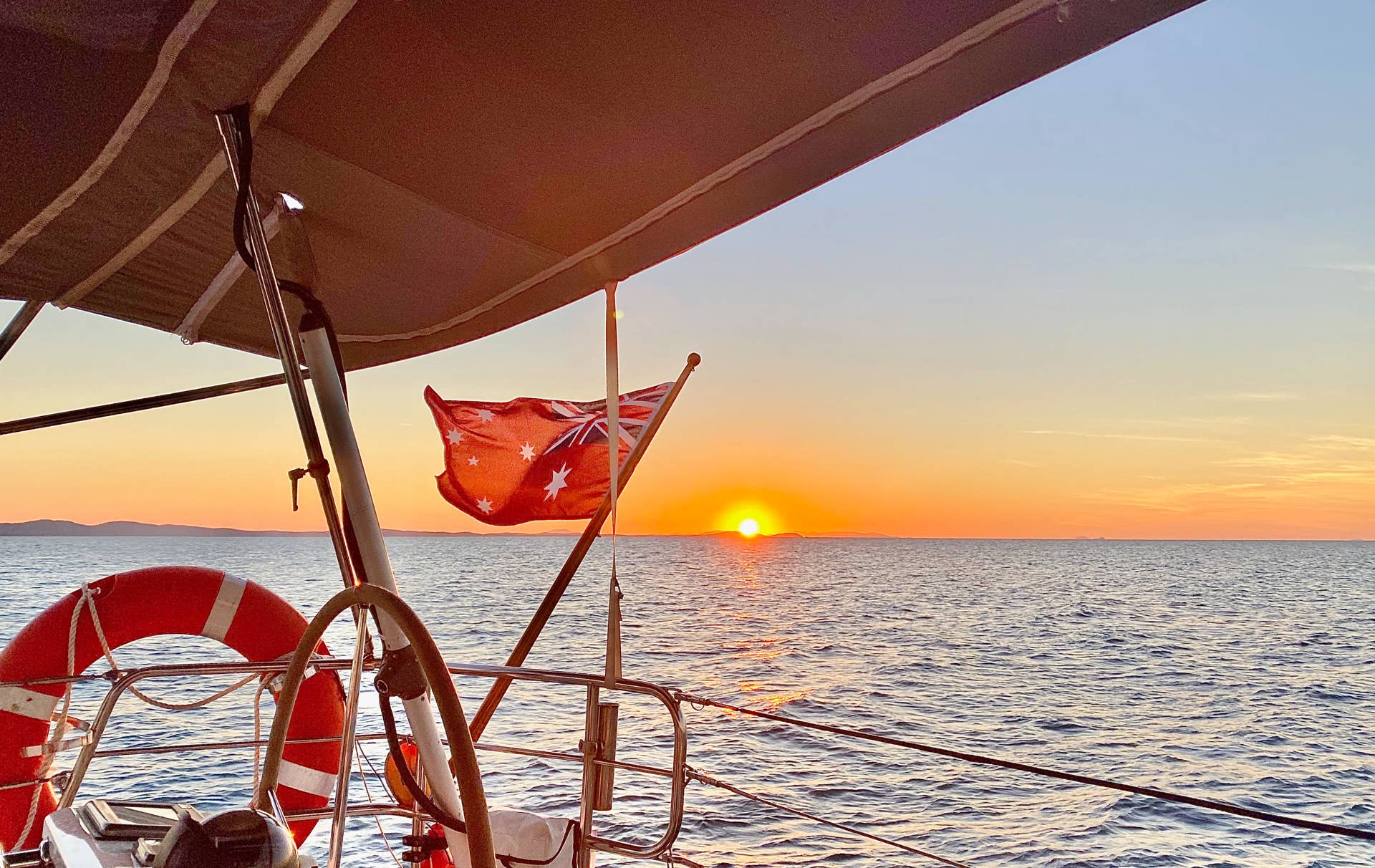 Sunset during a private spreading of the ashes ceremony on a private yaccht charter, Moreton Bay, Brisbane.